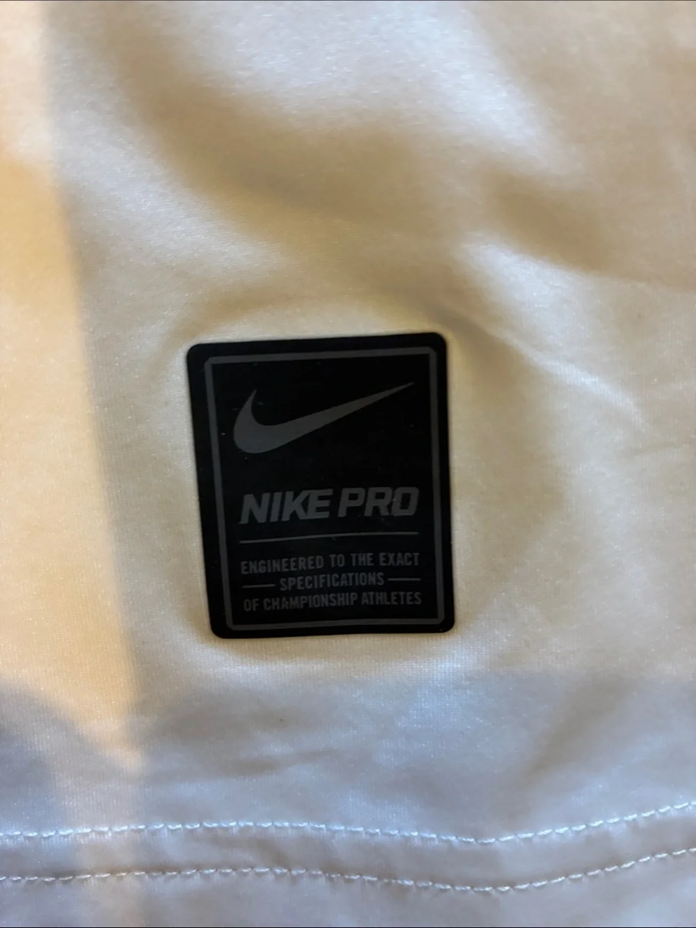Nike White Short-Sleeve Dri-FIT Training Tee with Black Swoosh